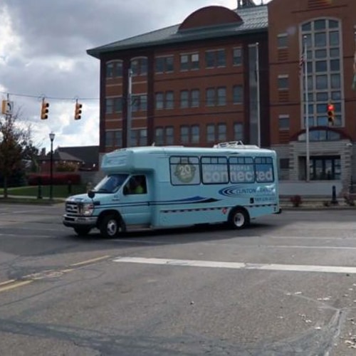 Clinton transit bus in downtown St. Johns, MI